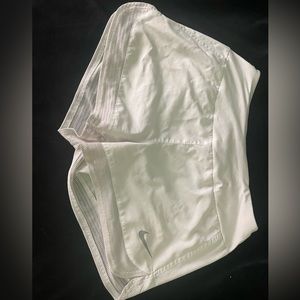 White nike running shorts